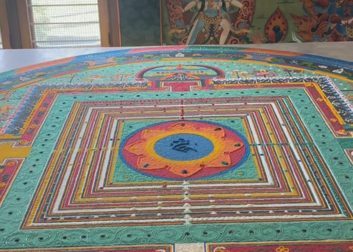 They spent days creating Mandala-then let the wind take it away.